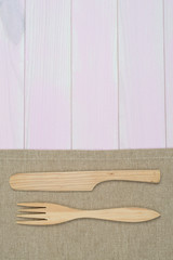 Kitchenware on beige towel