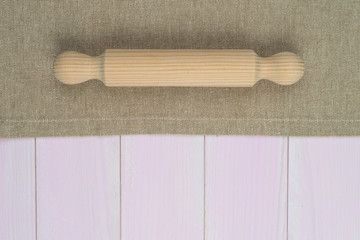 Kitchenware on beige towel
