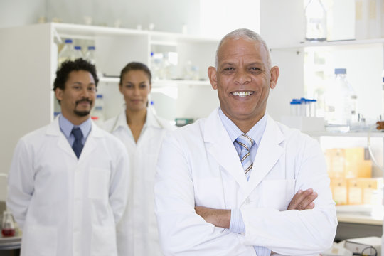 Smiling African scientists in laboratory
