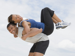 African couple in athletic clothing