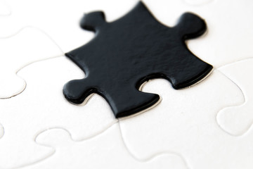 black and white puzzle pieces