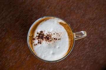 coffe latte cup on a wood table