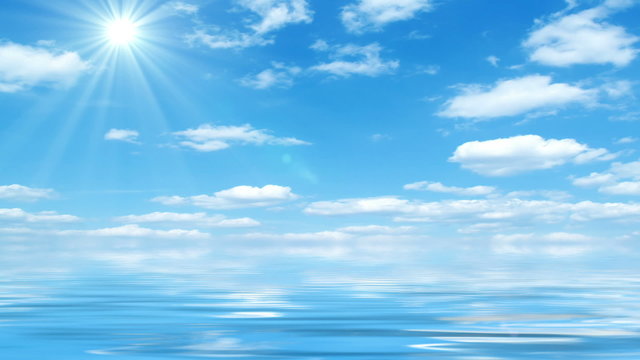 Beautiful Sea On Sunny Day With Blue Sky Reflecting In Water