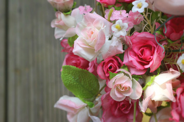 Beautiful vintage roses of artificial flowers