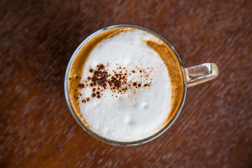 coffe latte cup on a wood table