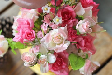 Beautiful vintage roses of artificial flowers