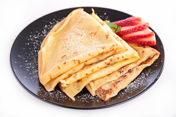 crepe with sugar and strawberry