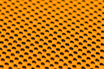 Close up detail of orange skid mat