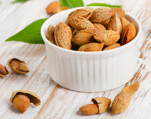 almond nuts on wooden table