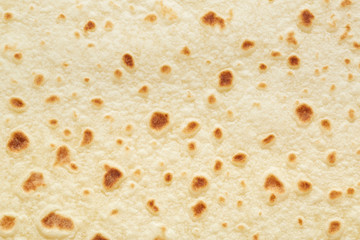 Piadina, italian tortilla texture background