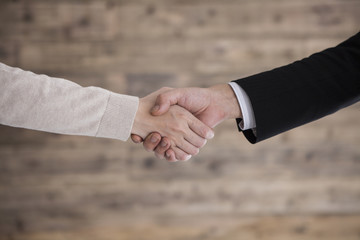 Men and women who are shaking hands