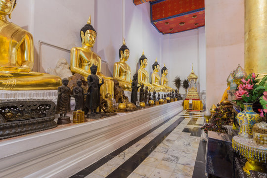 Golden Buddha statue sit  respectively in temple names "Wat Phra