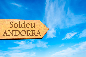 Wooden arrow sign pointing destination SOLDEU, ANDORRA