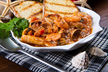 seafood soup with tomatoes and squid 
