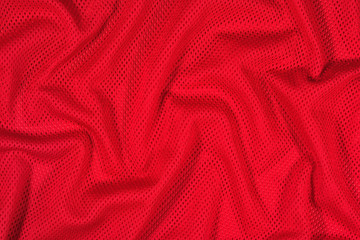 Red crumpled nonwoven fabric background