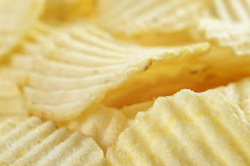 Obraz na płótnie Canvas rippled organic potato chips with salt