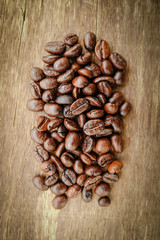 Coffee beans and wooden spoon 