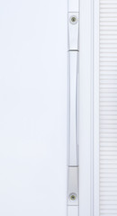 Close - up The modern silver metal door handle