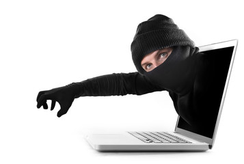 hacker stealing  hand out of computer cyber crime concept