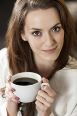 Business woman enjoying a coffee