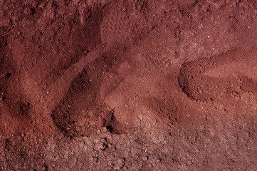 An abstract brown detailed soil texture.