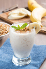 milkshake with banana, granola and cinnamon