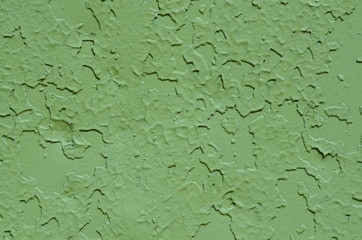 Green old painted metal texture, closeup.