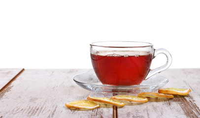 Glass cup with tea and a lemon on isolated on white 
