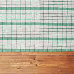 Tablecloth or towel over the wooden table