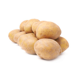 Pile of brown washed potatoes isolated