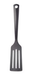 Used black plastic spatula isolated