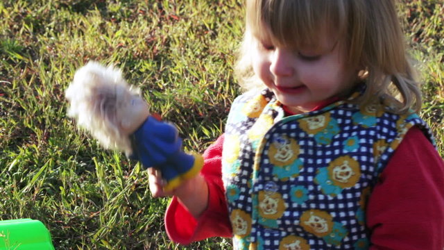 Girl with old doll