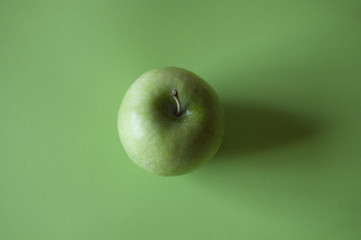 Apple with green background