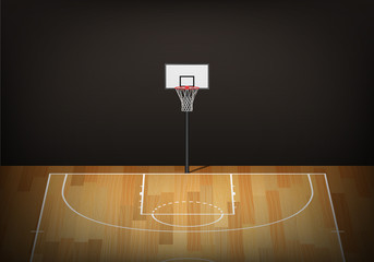Basketball hoop on empty wooden court © gomolach