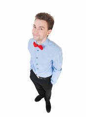 Smiling businessman in a bow tie looking up. top view.
