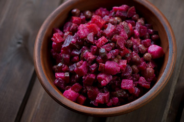Ceramic bowl with russian traditional vinaigrette salad