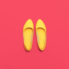 Glamorous Ladies' shoes on pink background