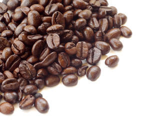 Brown coffee beans isolated on white background