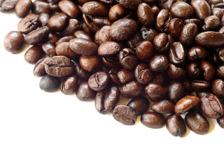 Brown coffee beans isolated on white background