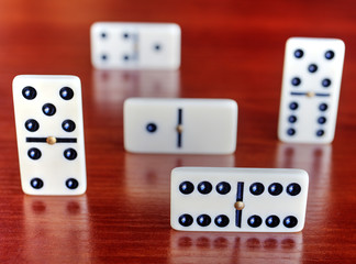 Dominoes on wooden board