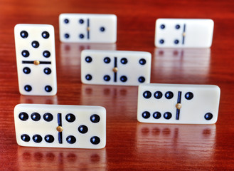 Dominoes on wooden board