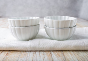 Empty white bowl on the kitchen table