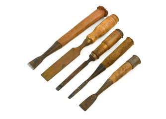 Old rusty chisels isolated on white background