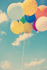 Vintage balloons flying in the sky