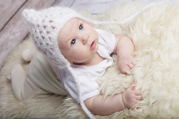 Adorable  baby in white hat