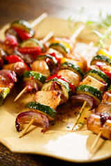 Grilled skewers with different kind of meat and vegetables