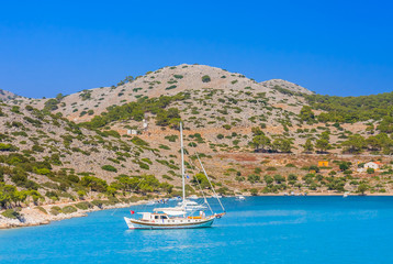 Bay Panormiti the monastery. Symi Island. Greece