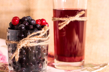 glass with berries and fruit compote