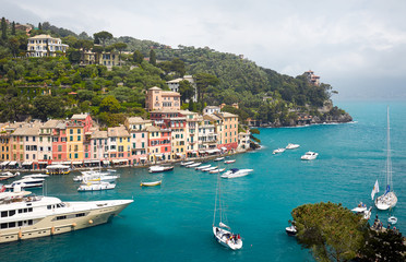 Fototapeta na wymiar Idyllic Portofino Harbor: Vibrant Seaside Town with Luxury Yachts, Italy