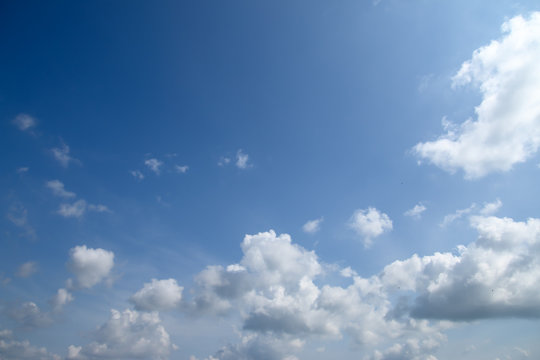 White clouds in a blue sky
